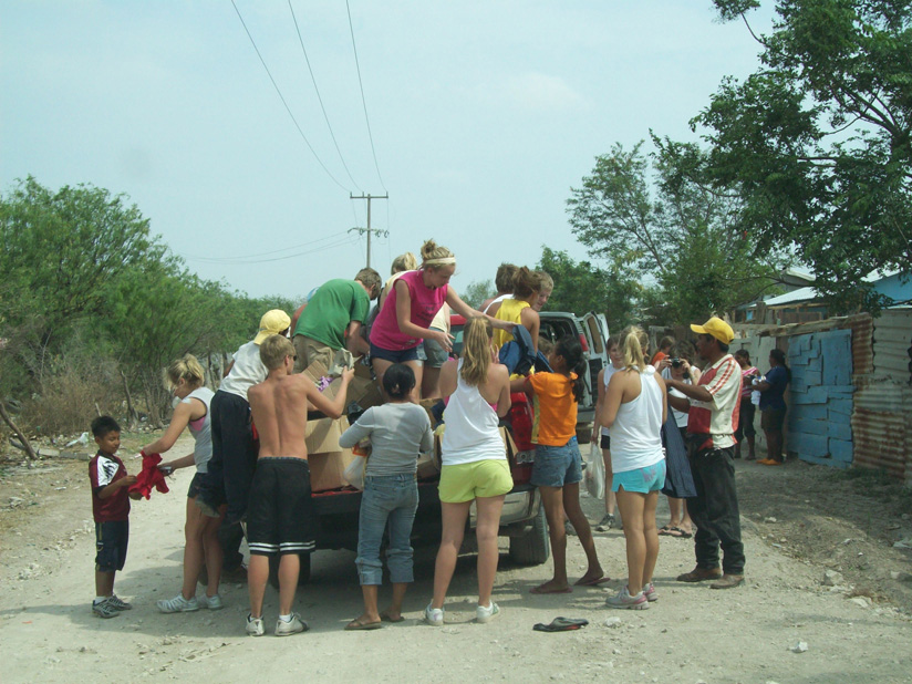 1 - Mission Team youth during a distribution