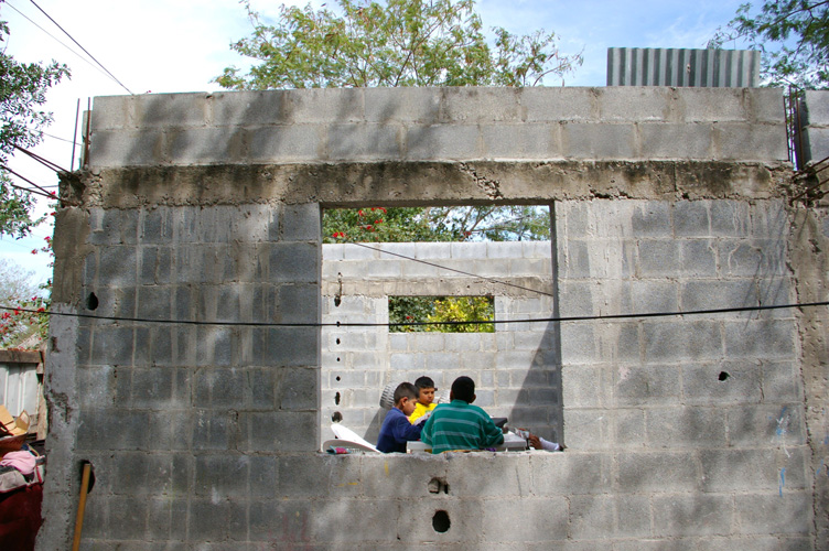 13 - Gabriela's home, the walls that were built years ago that never had a roof